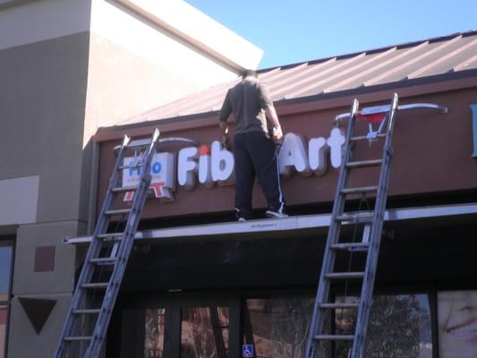 Installing Channel Letters on Building