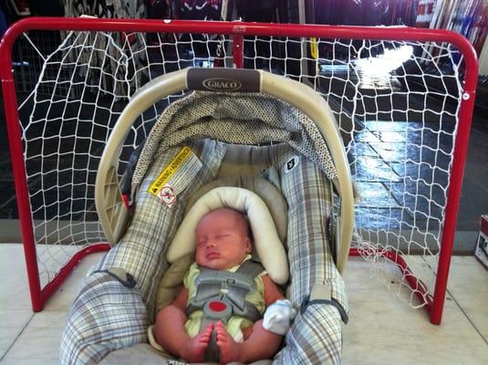 Kids hockey net!!  Gotta get him on the right path...