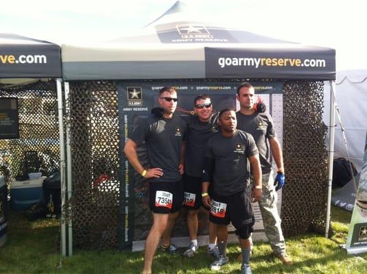 Four of the recruiters from the station at the 2013 Tough Mudder at Vail Lake