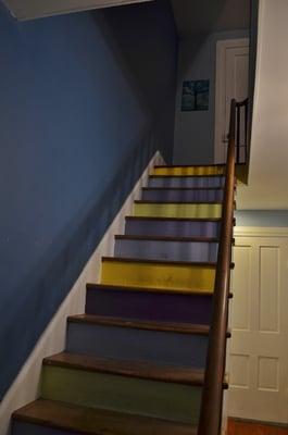 walk up the colorful friendly steps to the dining room.