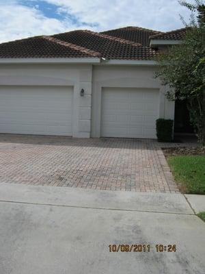 Low pressure chemical roof cleaning before