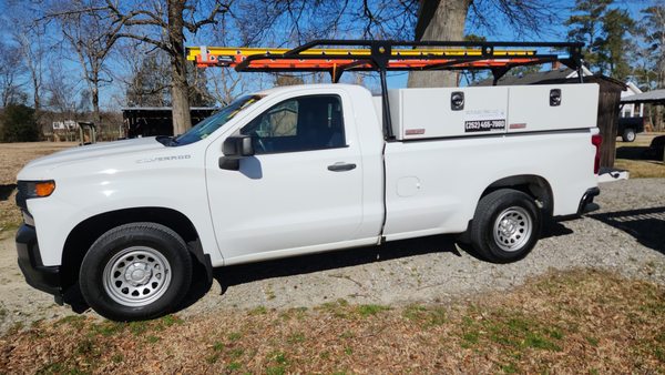 Service truck full of electrical repair and installation equipment and supplies.