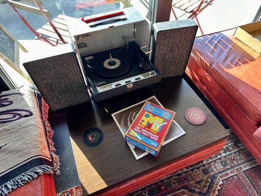 Old style turntable on display with MTV party game.