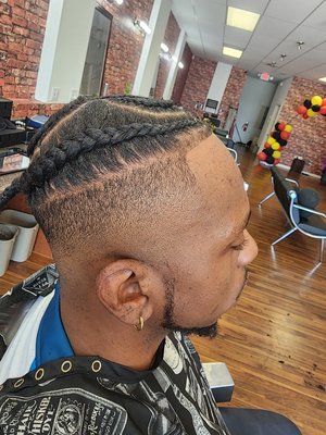 Fresh Fade around designer braids