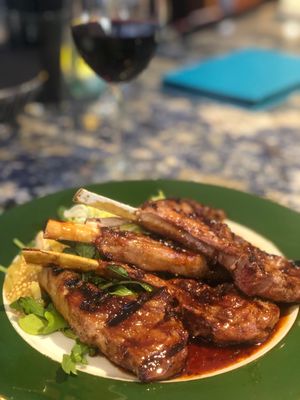 lamb chops with pineapple salsa and a wine demi glaze.