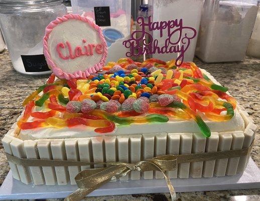 Specialty cake. This was a candy theme!  Inside is a funfetti cake with vanilla buttercream and covered with her favorite candies!