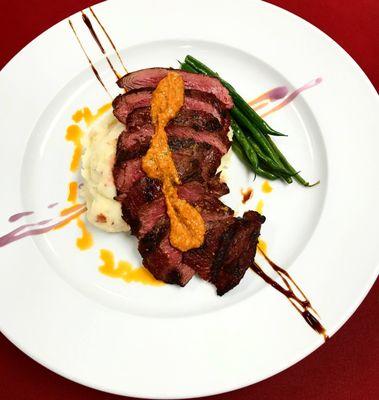 8 ounce Australian ostrich char-grilled to order, served over cheddar mashed potatoes and finished with sauce Romesco