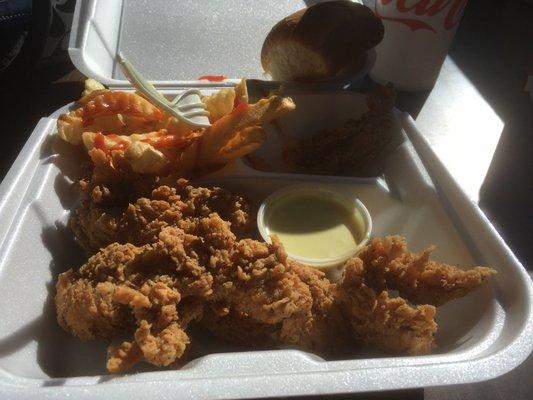 Chicken tenders, fries and honey mustard sauce