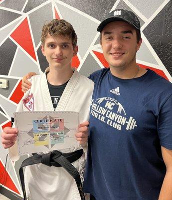 My youngest after receiving his black-belt.