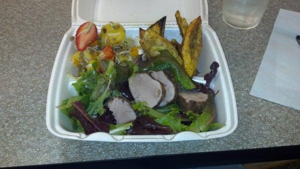 Cafeteria food...jerk pork salad with strawberry vinagrette, plantains, fruit salad. So good