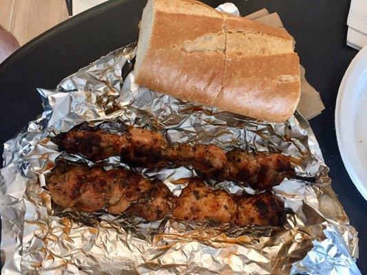 Two Chicken Souvlaki Sticks (comes with bread -- $8. Great lunch! Try it with a squeeze of lemon and hot sauce.