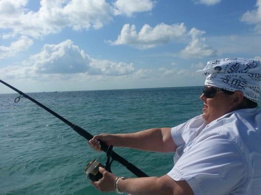 Linda D. bringing in a tarpon during Sunrise/Sunset Tarpon Tournament.