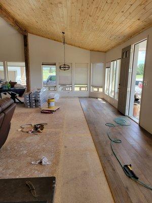 Wide plank engineered wood floor installation in Mancos Co. Client Reference available .