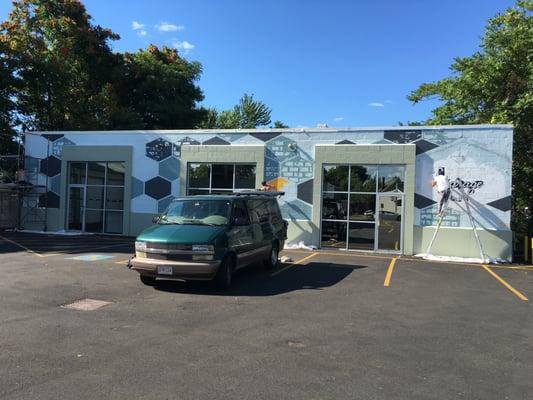 Painting the mural on the exterior of the Podcast Garage! We open on August 3rd!