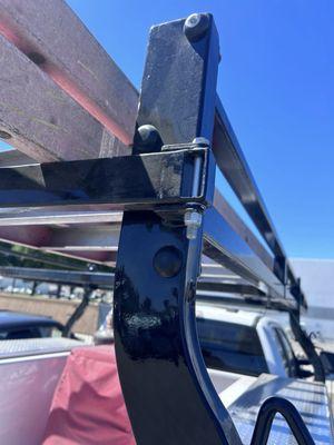 The leader rack is bolted,flimsy ,and weak compared to my old welded one and I am not putting anything up here except ladders !! ‍