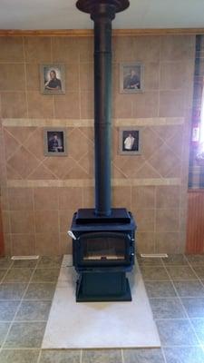 New Regency wood stove replacing an old non EPA unit for  cleaner burning and hi efficiency.