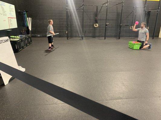 My 9 year old working out with our trainer getting ready for baseball season