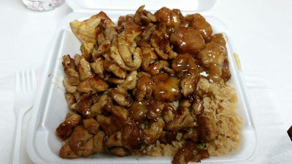 Teriyaki chicken/Sesame chicken combo with potatoes and rice.