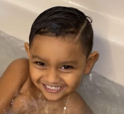 My son's haircut during a bath