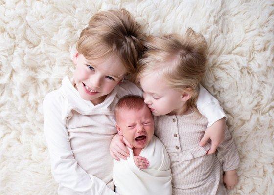 newborn with siblings