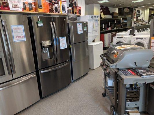 Some fridges, heaters and a laundry center / stacker. We swap display appliances often.