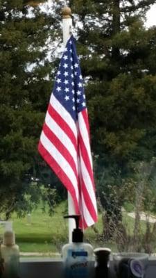 Our Flag outside the bar Window at Lodge 1900