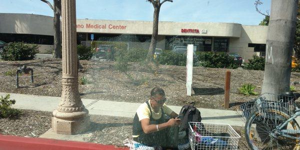 Homeless people laying around the Sano Medical center.