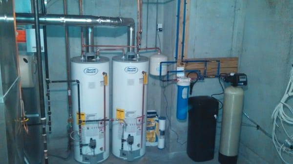 New pressure regulator,whole house sediment water filter,water softener,& dual water heaters with new exhaust piping.