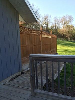 Fenced in porch off the homestead. Great for pups!