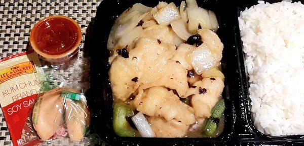 Lunch special fish in black bean sauce. Ask for this black plastic container to avoid thin foam container that melts with heated contents.