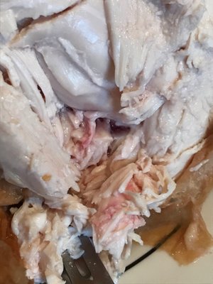 Raw rotisserie chicken that is labeled "Ready to Eat"