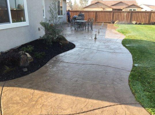 stamped concrete patio installation in Granite Bay, California backyard