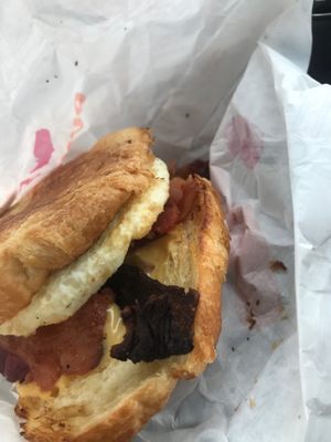 Bacon egg and cheese croissant sandwich