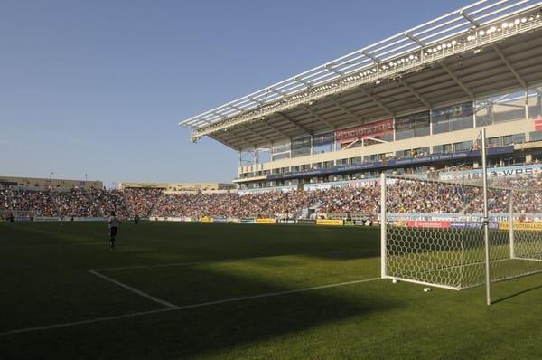 Fans enjoying a Red Stars game at Toyota Park on a beautiful summer day