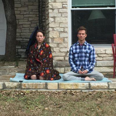 Our owners meditating during a teachers retreat.