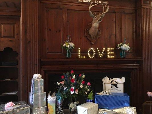 The arrangements on the mantel and table were done by Royers.