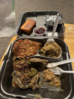 Chop steak, spaghetti, dressing, cranberry sauce, and cornbread.