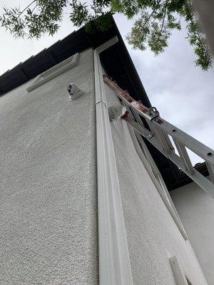 Wired cameras installed on a residential home