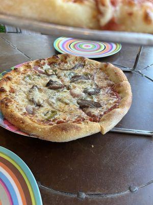 Closeup of steak and cheese pizza