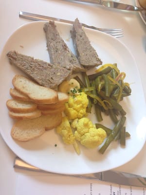 Terrine De Campagne: baguette crisps, pickled cauliflower, dilly green beats, meatloaf.