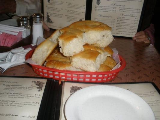 Complimentary bread. Yum. Comes with REAL butter, not margerine.