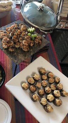 Stuffed mushrooms, grilled prawns, and bacon wrapped dates (in dish)!