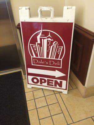 Sign in the foyer saying Dale's Deli is open.