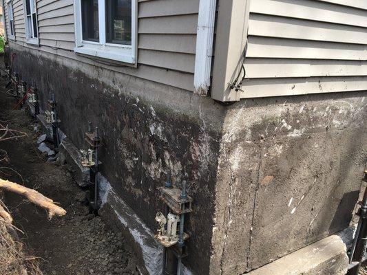 Foundation Repair with Helical Piers