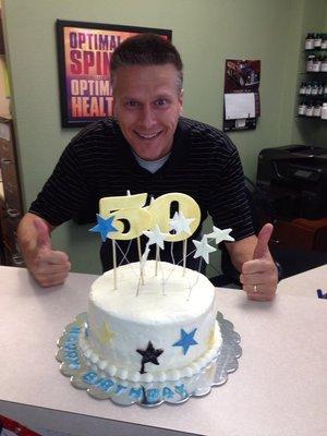 Dr. Scott celebrating his 50th birthday in the clinic!