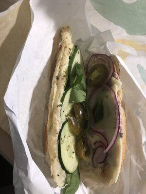 I asked for spinach, onions, and jalapeños on my sandwich and this is what I got... Cheap, Cheap, Cheap!