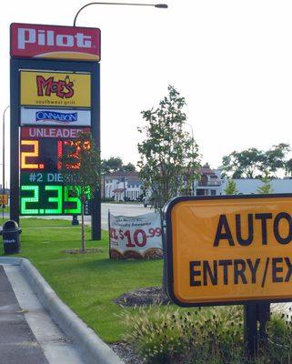 Main Street signage with gas prices