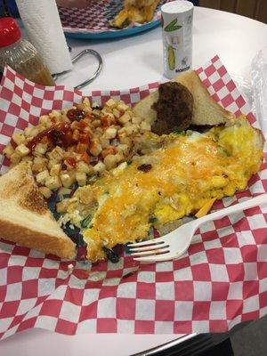 Veggie omelet & potato cubes with turkey sausage. (Sorry. I forgot to take photo before digging in.).