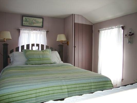 Loft bedroom with queen size bed.