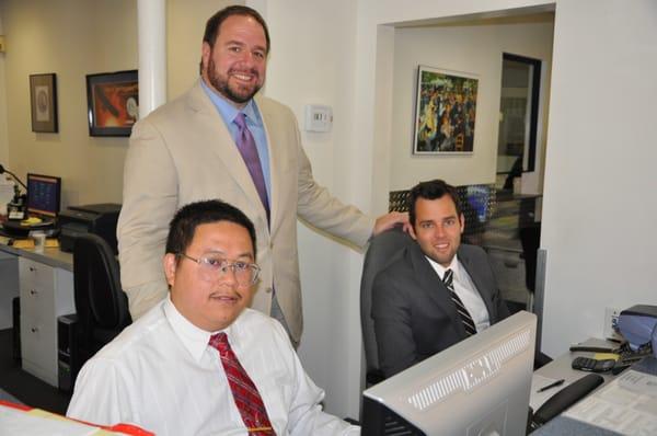 Eric, Ed and Grant have fun during picture taking. All recommend the right bullion combination and guarantee the best prices.